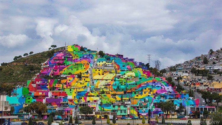 Fotos: El mayor mural de México pintado sobre las casas de un barrio erradica la violencia