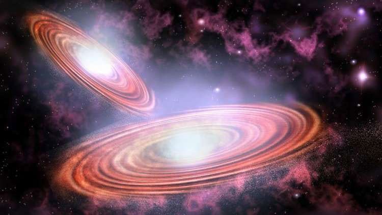 El choque de dos agujeros negros supermasivos generará una potente explosión