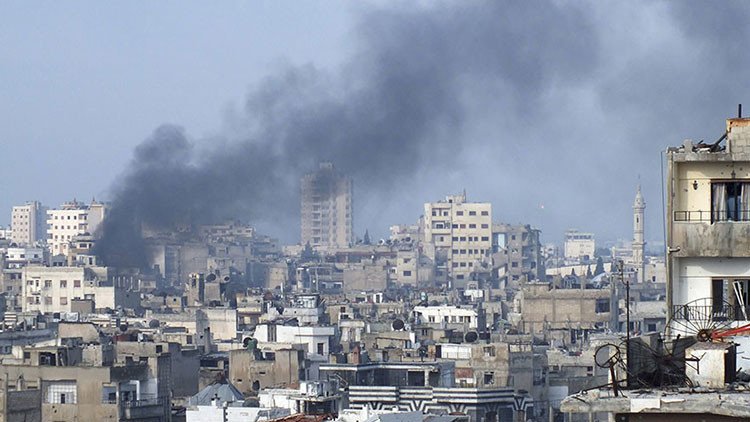 Siria: Al menos 12 muertos por dos ataques suicidas en Homs (fotos)