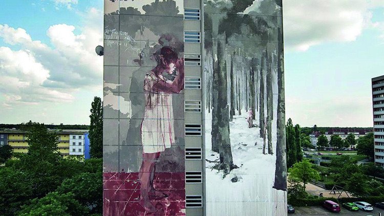Polémica en Berlín por mural de un pintor español con una niña refugiada ensangrentada (foto)