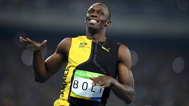 "Iba a toda marcha, sonriendo": la historia de la foto que plasma la superioridad de Usain Bolt