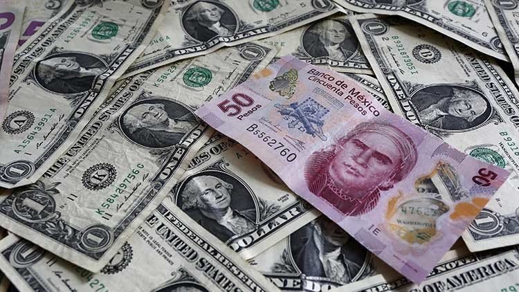 El peso mexicano alcanza un nuevo mínimo histórico de 22 unidades por dólar