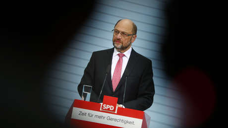 Un hombre que no terminó la secundaria puede destronar a Angela Merkel