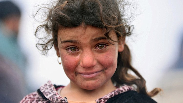 Fotos desgarradoras: Niños muertos, la carga amarga de los desplazados de Mosul 