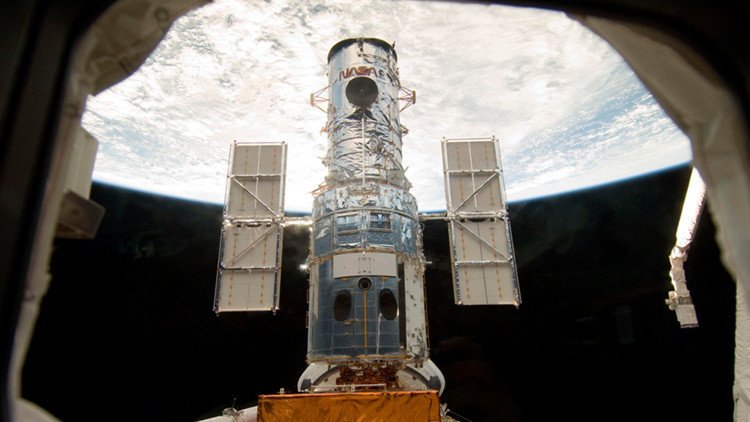 El telescopio espacial Hubble capta una galaxia 'suicida' que se devora a sí misma (FOTO)