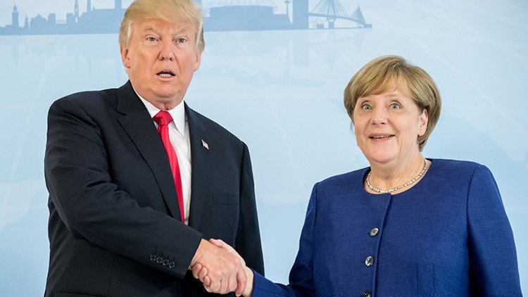 Por fin: Merkel y Trump se dan un apretón de manos en vísperas de la cumbre del G20 (VIDEO)