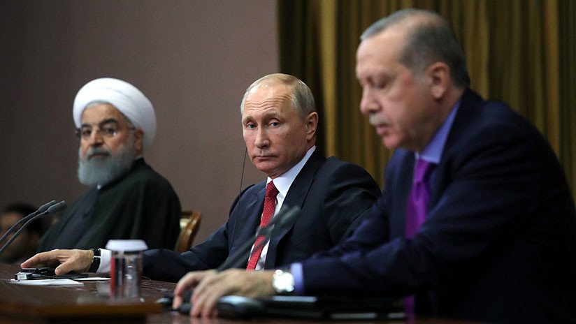 En el encuentro entre Rusia, Irán y Turquía Putin hizo algo extraño con la silla de Erdogan (VIDEO)