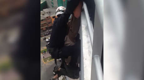 FUERTE VIDEO: Un suicida cae desde una azotea y muere tras un fallido rescate en Perú