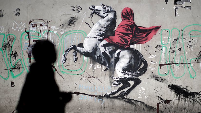 FOTOS: Banksy cubre muros en París con sus grafitis sobre la migración