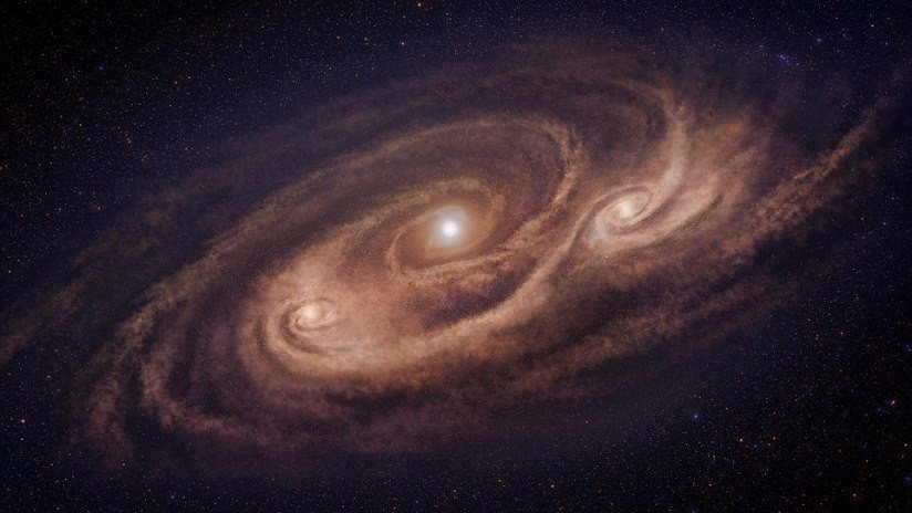 FOTO: Captan una antigua galaxia 'monstruo' que debía haberse destruido a sí misma
