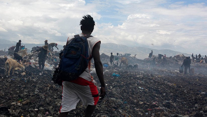 Humo, indigencia y toneladas de basura: La vida en el vertedero más grande de Haití, en imágenes