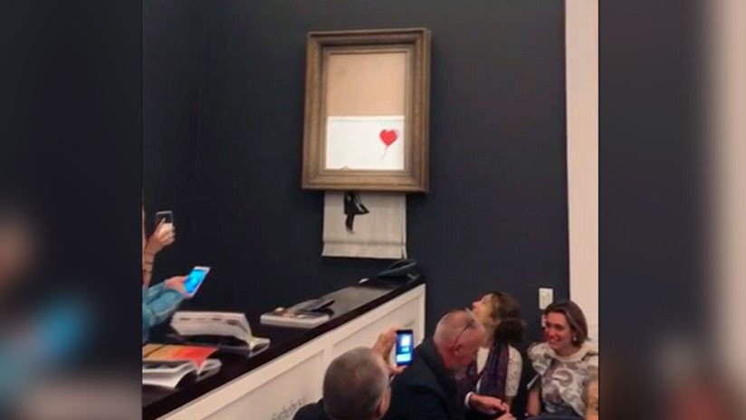 VIDEO: Subastan una obra de Banksy por 1 millón de dólares y se autodestruye