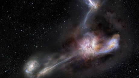 Un 'caníbal' que devora a sus vecinos: Revelan el secreto del brillo de la galaxia más luminosa 