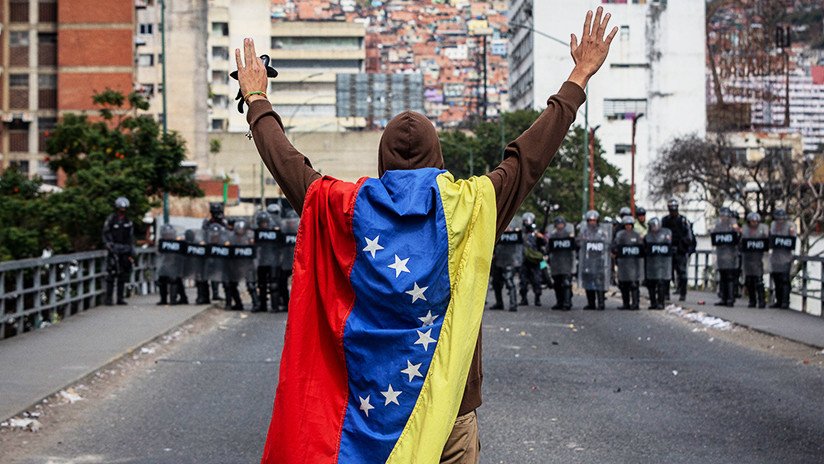 China insta a las partes en Venezuela a combatir la injerencia externa