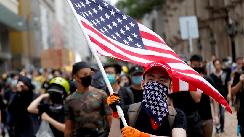 Ron Paul sobre Hong Kong: "No importa dónde comience o se agite una revolución, EE.UU. está allí"