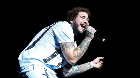 VIDEO: El rapero Post Malone lanza en un concierto una 'lluvia de dinero' de 50.000 de dólares