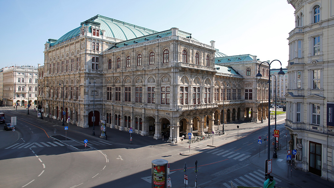 The opera house and empty streets are seen in Vienna