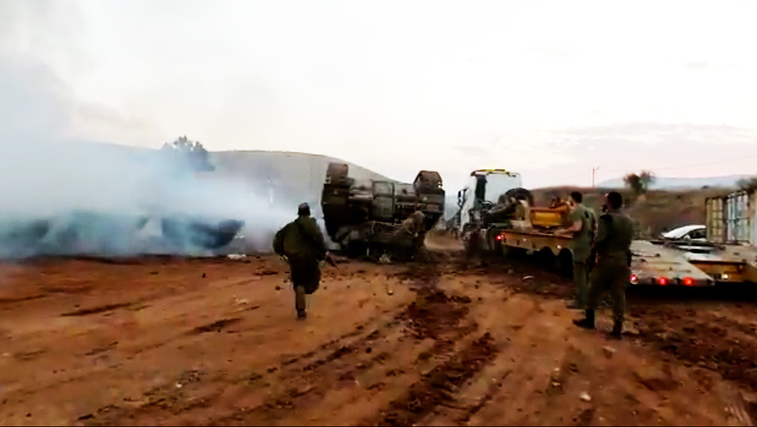 Un tanque israelí vuelca al subir a un camión y casi aplasta al comandante (VIDEOS)
