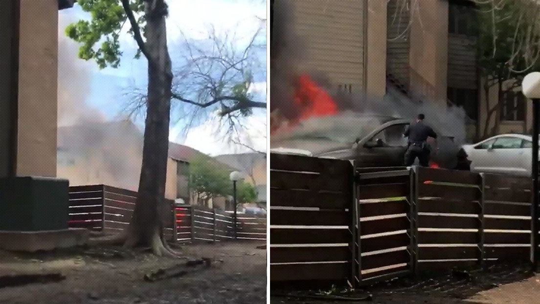 Dos policías sacan a un hombre inconsciente de un vehículo en llamas justo antes de que explote (VIDEO)