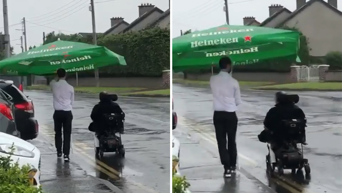 VIDEO: Un camarero usa una sombrilla de bar para proteger a un cliente en silla de ruedas en medio de un aguacero