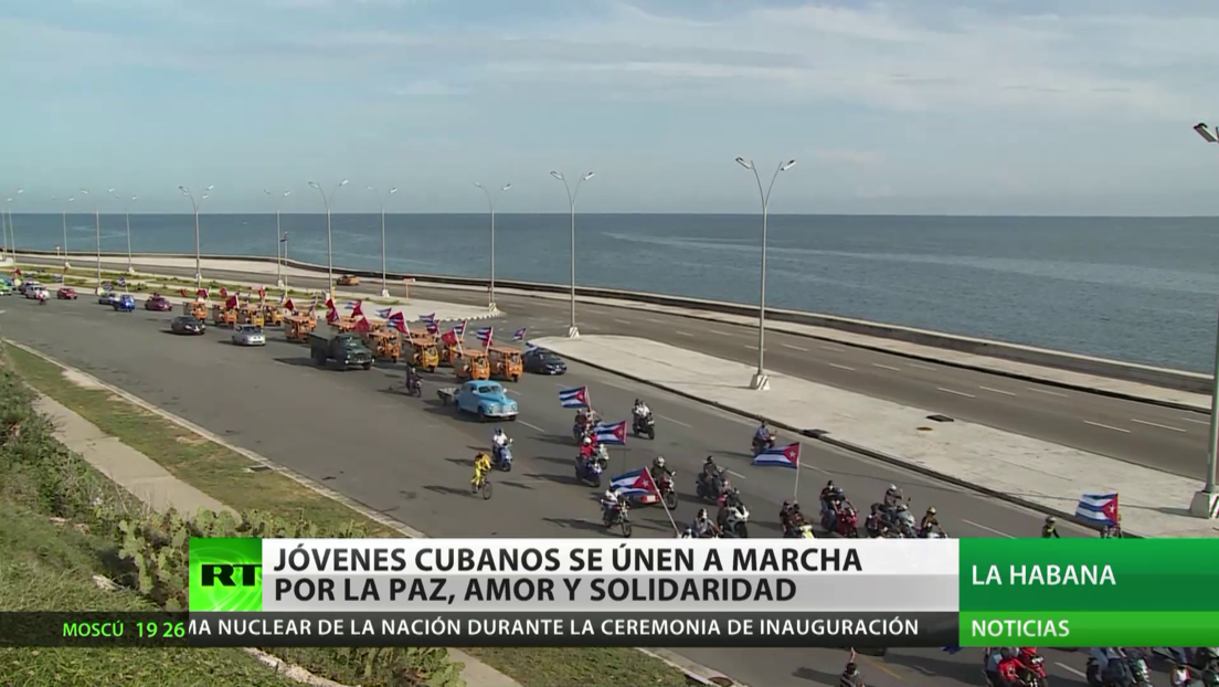 Jóvenes cubanos se unen a la marcha por la paz, el amor y la solidaridad