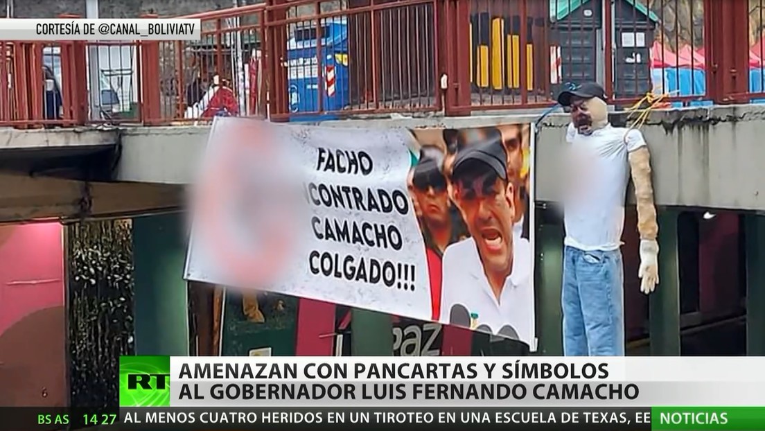 Amenazan al gobernador del departamento boliviano de Santa Cruz con pancartas y muñecos colgados en puentes
