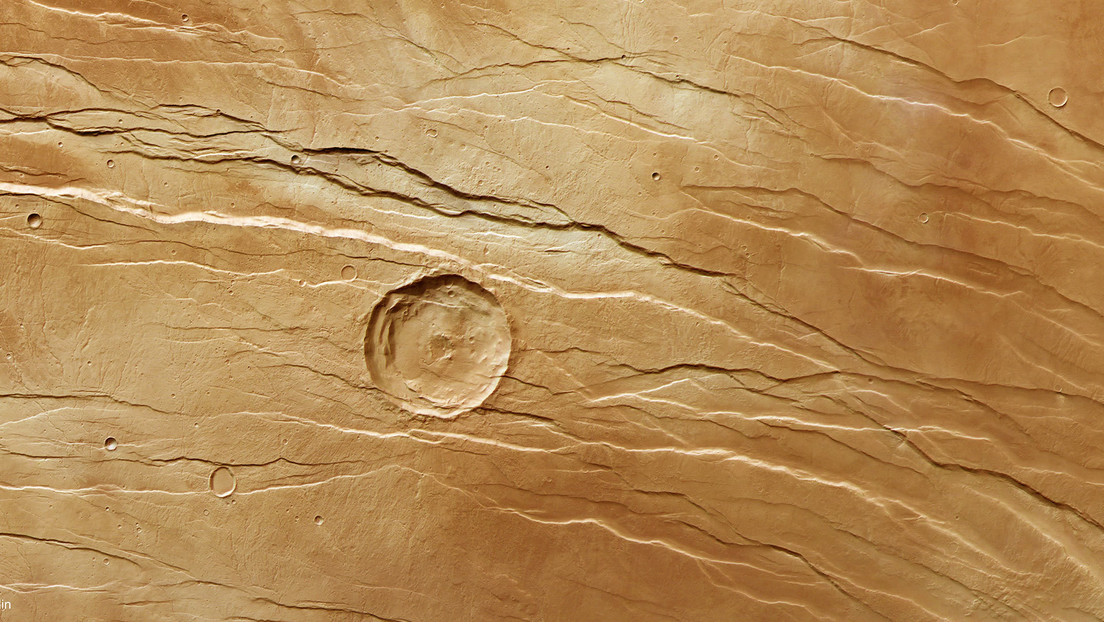 Nuevas imágenes muestran fosas parecidas a 'marcas de garras' sobre la superficie de Marte