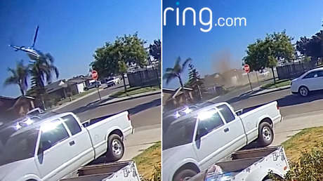 Un helicóptero cae sobre una palmera en un vecindario residencial en EE.UU.