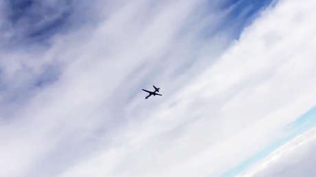 Un caza ruso escolta un dron estadounidense sobre el mar Negro