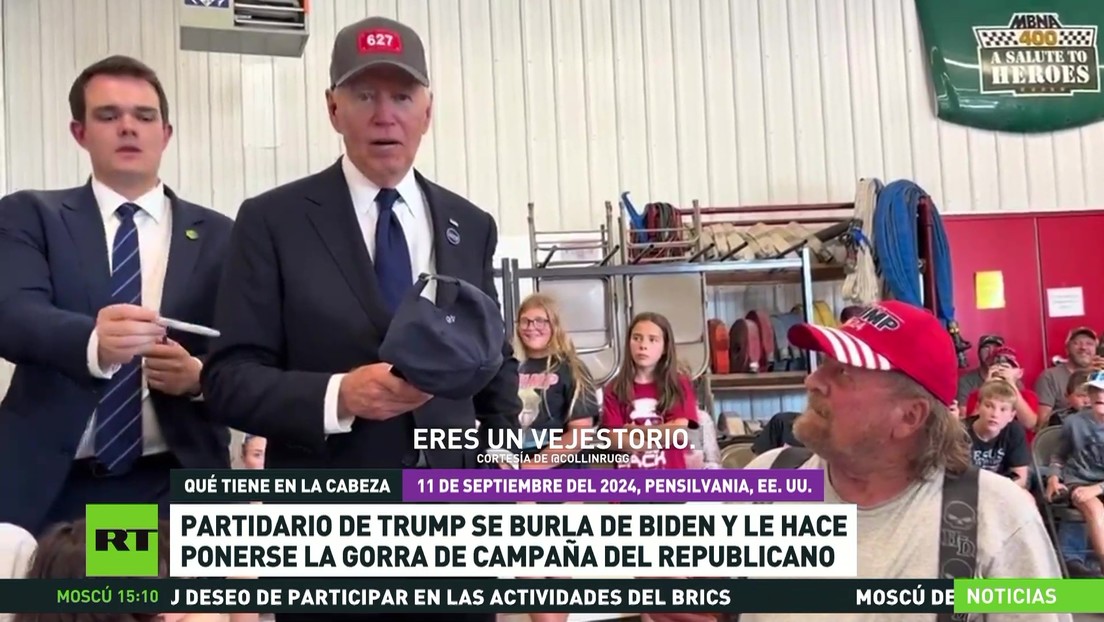 Partidario de Trump se burla de Biden y le hace ponerse una gorra del republicano