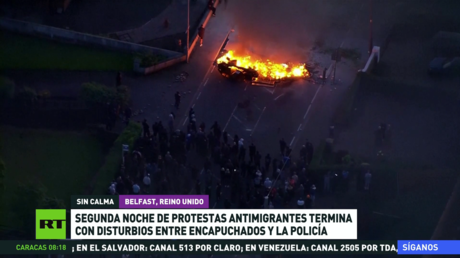 Segunda noche de protestas antimigrantes termina con disturbios entre encapuchados y la Policía