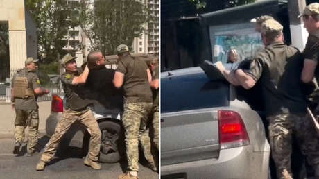 Reclutadores ucranianos meten a la fuerza a un hombre en un coche para enviarlo al frente (VIDEO)