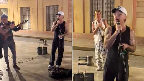 Robbie Williams canta con un músico callejero en España (VIDEO)
