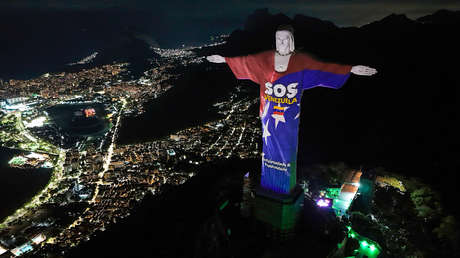 Las emotivas imágenes del Cristo Redentor iluminado de solidaridad con Venezuela (VIDEO)