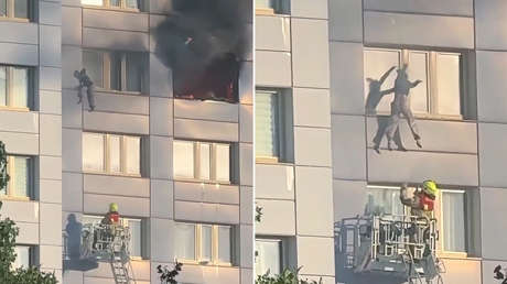Rescate 'de infarto' de una mujer atrapada en el 11.º piso de un rascacielos en llamas (VIDEO)