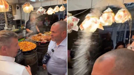 Arrojan vino al primer ministro de Hungría (VIDEO)