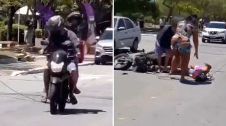 Cable suelto en medio de la calle provoca caída brutal de dos mujeres en moto (VIDEO)