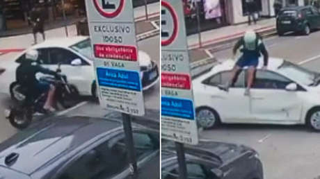 VIDEO: Un motorista sale despedido por los aires y acaba sentado sobre un coche como si nada