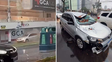 MOMENTO EXACTO: Pared de edificio cae sobre auto en movimiento (VIDEO)