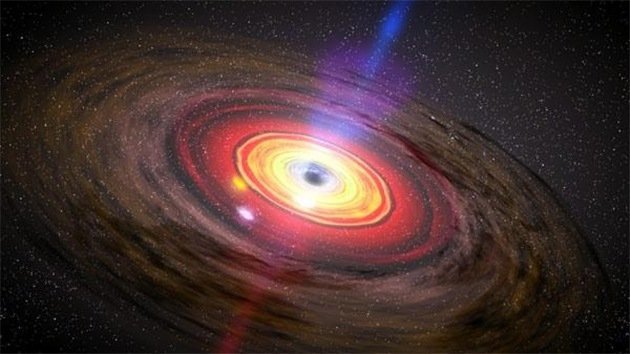 Descubren un agujero negro con una masa 10.000 millones de veces la del Sol