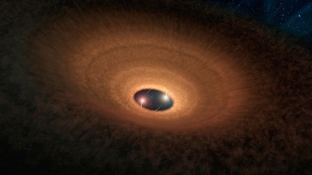 Encuentran un sistema estelar con un 'hula hoop' cósmico