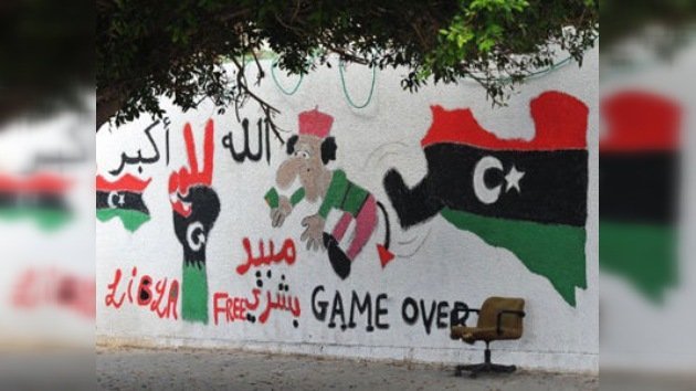 Caricaturas reemplazan los carteles oficiales de Gaddafi 