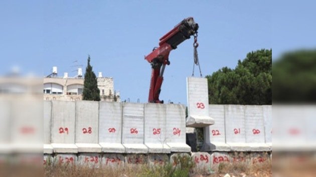 Israel empieza a desmantelar el muro entre judíos y palestinos