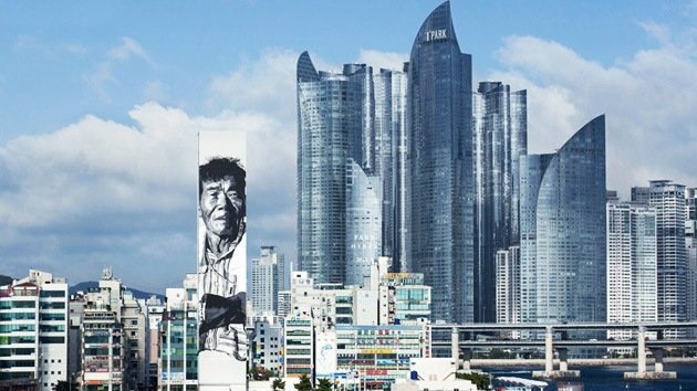 Fotos: Un artista alemán crea el grafiti más alto de Asia