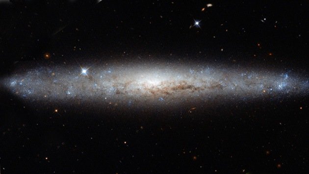 Hubble 'desempolva' una hermosa galaxia espiral