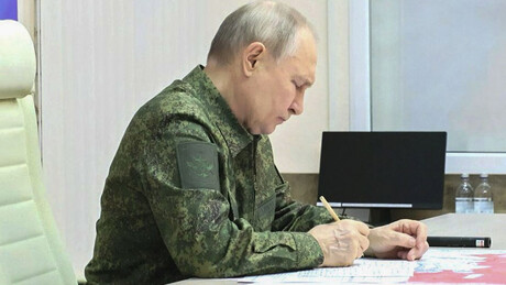 Kremlin Press Office / Handout/Anadolu