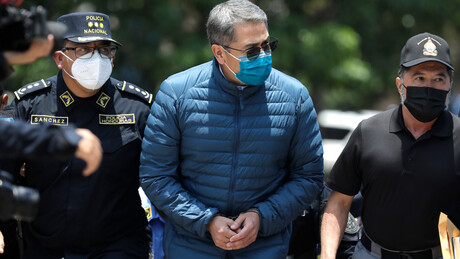 Ex-presidente de Honduras retorna a país após indulto de Trump