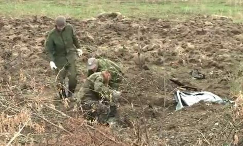 Nach Rückzug der ukrainischen Armee wird viertes Massengrab in Ostukraine gefunden