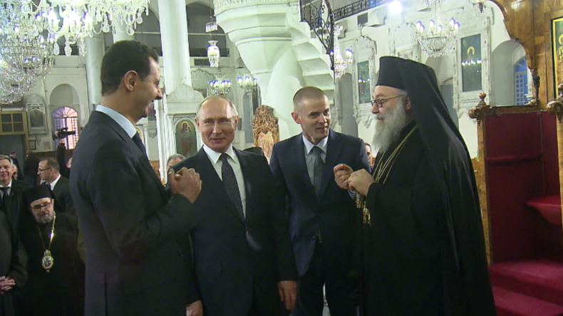 Putin und Assad scherzen: "Trump sollte hier in die Kirche kommen, dann wird er ein besserer Mensch"