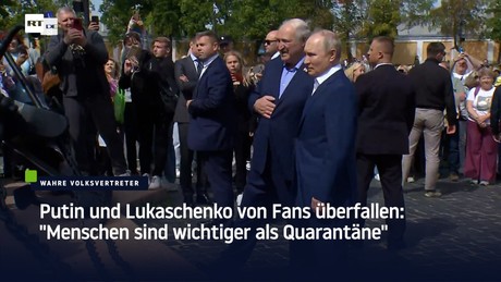Putin und Lukaschenko von Fans überfallen: "Menschen sind wichtiger als Quarantäne"